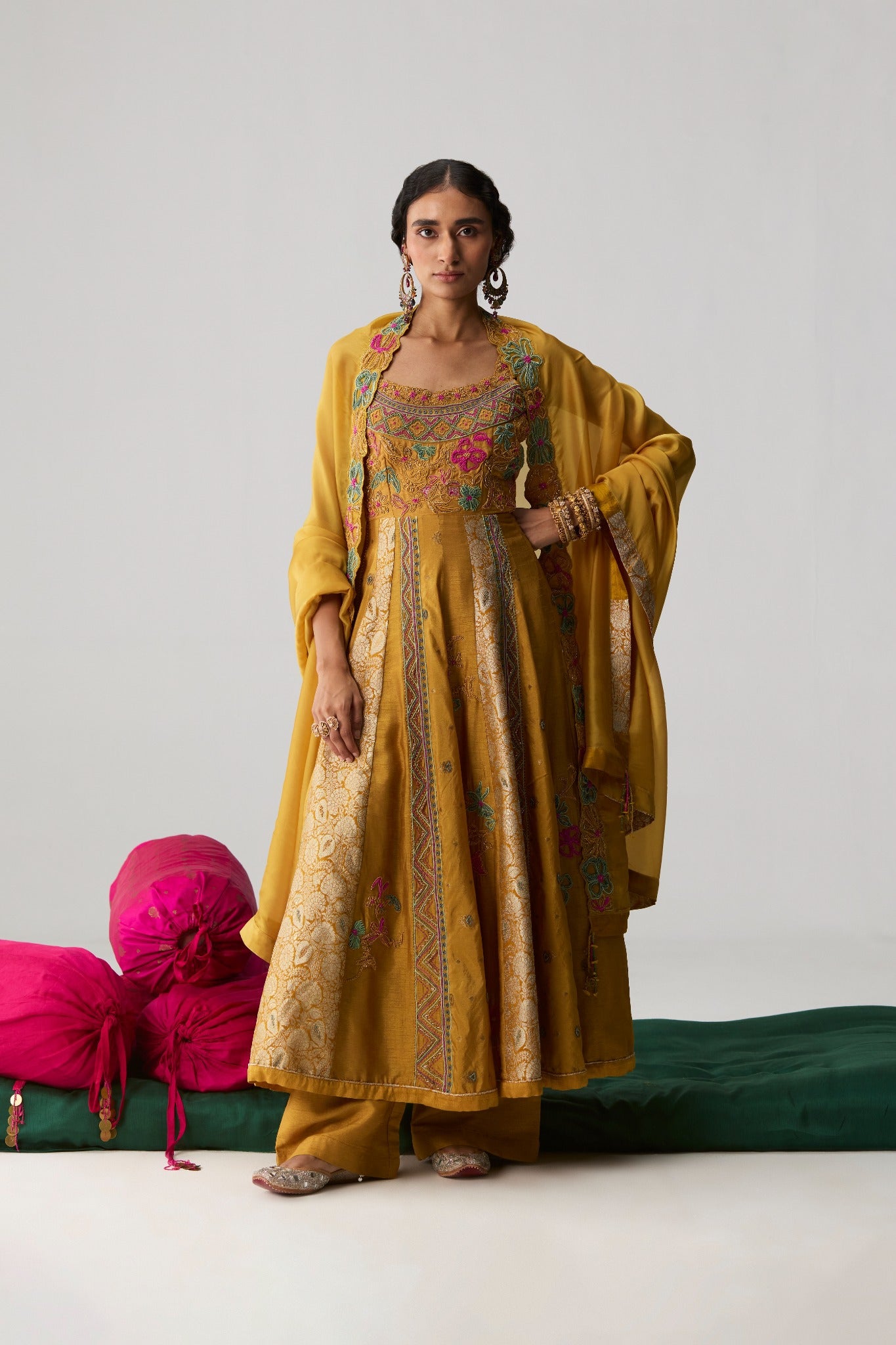 Nehmat – mustard embroidered yoke Anarkali with Banarasi raw silk panels and organza dupatta by Julie & Rinki