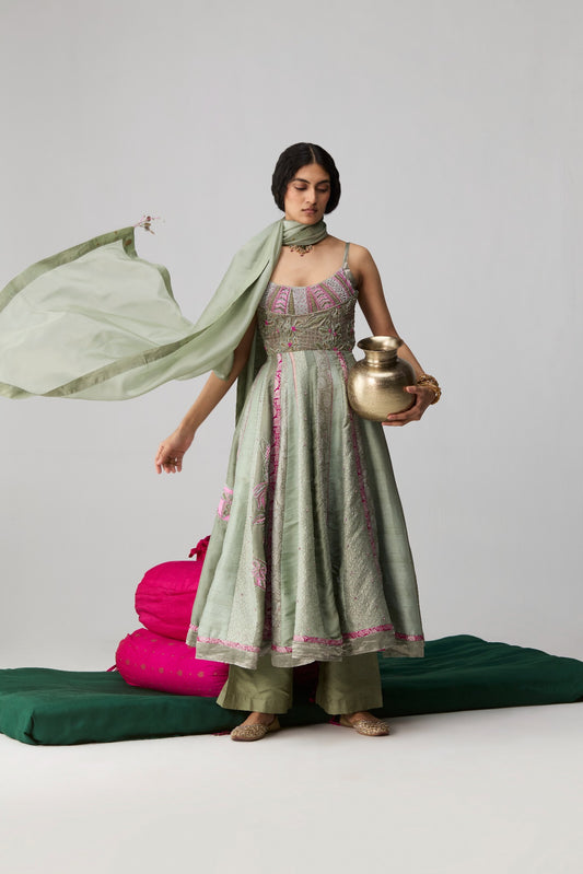 Irsya – sage green embroidered yoke Anarkali with Banarasi raw silk panels and organza dupatta by Julie & Rinki