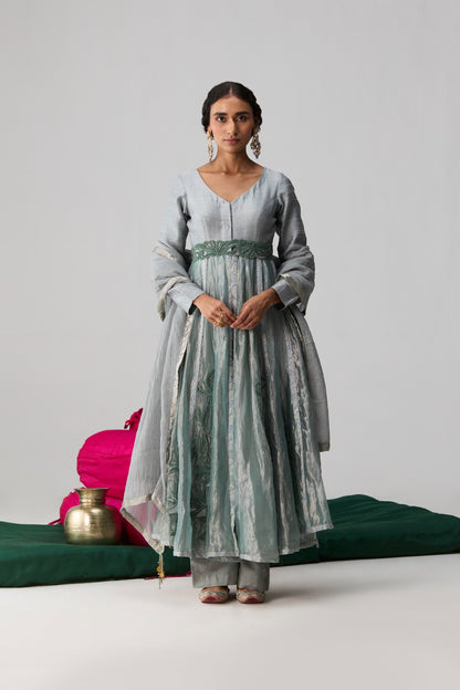 Kira – blue green abstract floral Banarasi panel Anarkali with raw silk pants and belt by Julie & Rinki