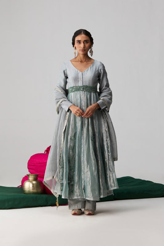 Kira – blue green abstract floral Banarasi panel Anarkali with raw silk pants and belt by Julie & Rinki