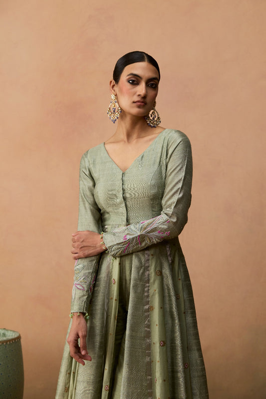 Tara – sage green abstract floral Banarasi panel Anarkali with raw silk pants and organza dupatta by Julie & Rinki