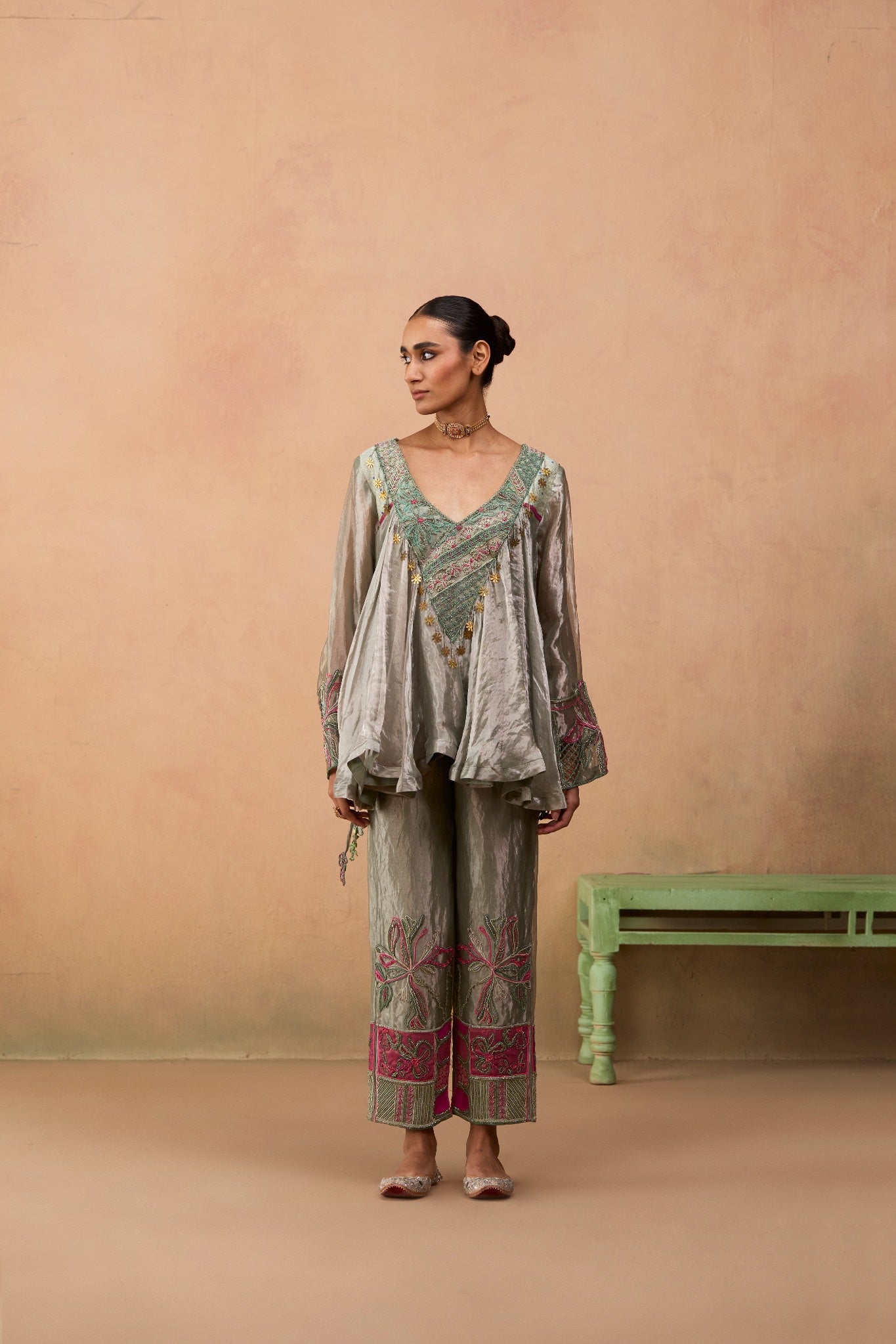 Raha – dark green silver tissue embroidered peplum kurta with Banarasi brocade pants by Julie & Rinki